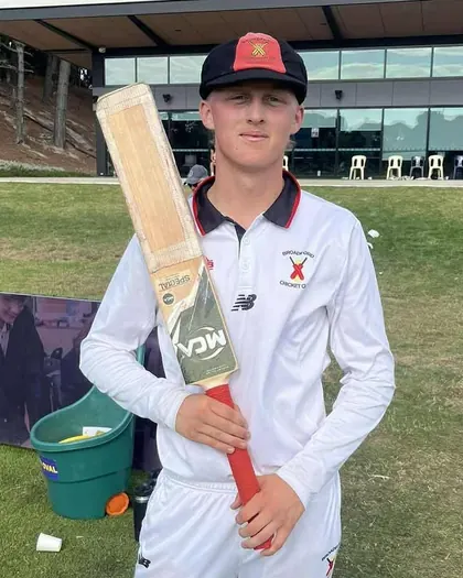 Josh Nolan with his bat after his maiden 1st XI century